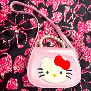 Pink Hello Kitty purse with pearl handle